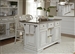 Magnolia Manor Kitchen Island with Granite in Antique White Finish by Liberty Furniture - 244-IT6032G
